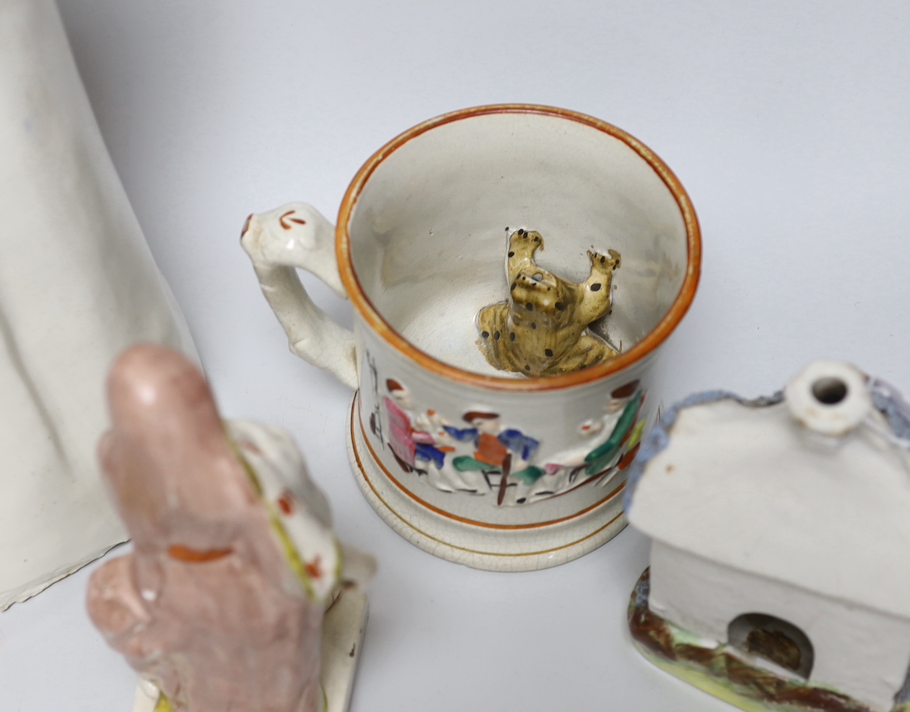 A tall Staffordshire pottery figure of Queen Victoria, a Staffordshire 'frog' mug and three various Staffordshire pottery figures (5), tallest 42cm high